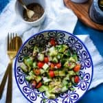 Chopped Cucumber, Avocado, Cherry Tomatoes and Onions as a salad in a bowl