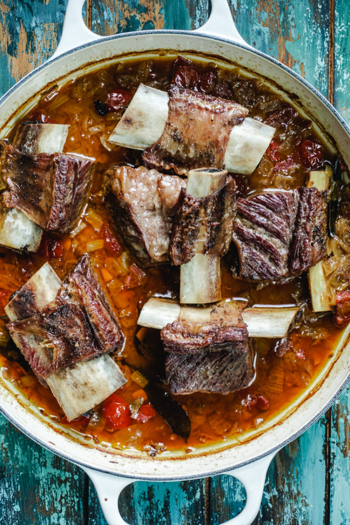 Short ribs curry in a white dutch oven