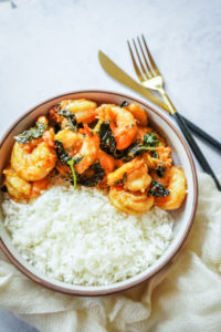 Top shot of Shrimp and basil with White rice in a bowl