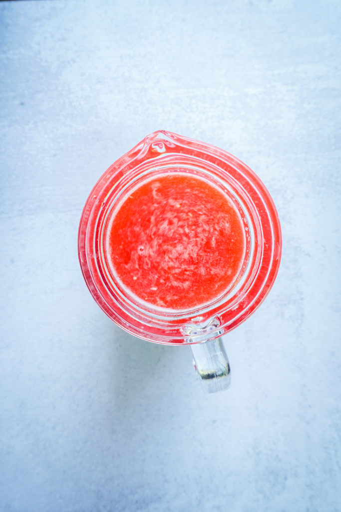 A pitcher of strawberry lemonade