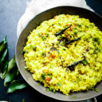 grey bowl with rasam rice in it