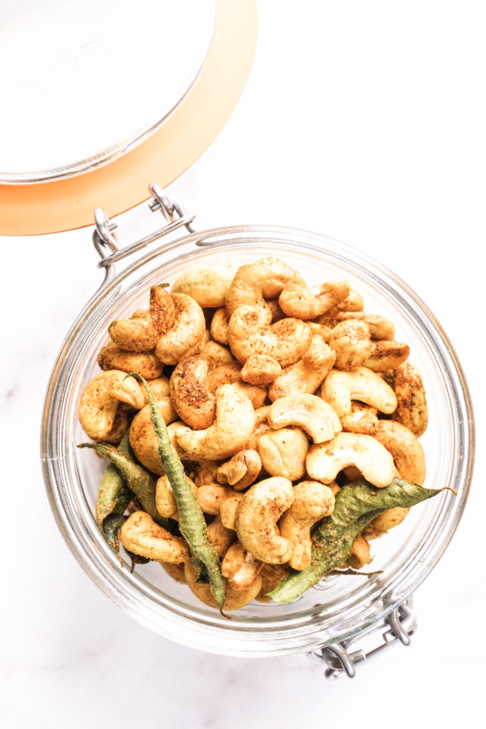 Roasted cashews in a glass jar