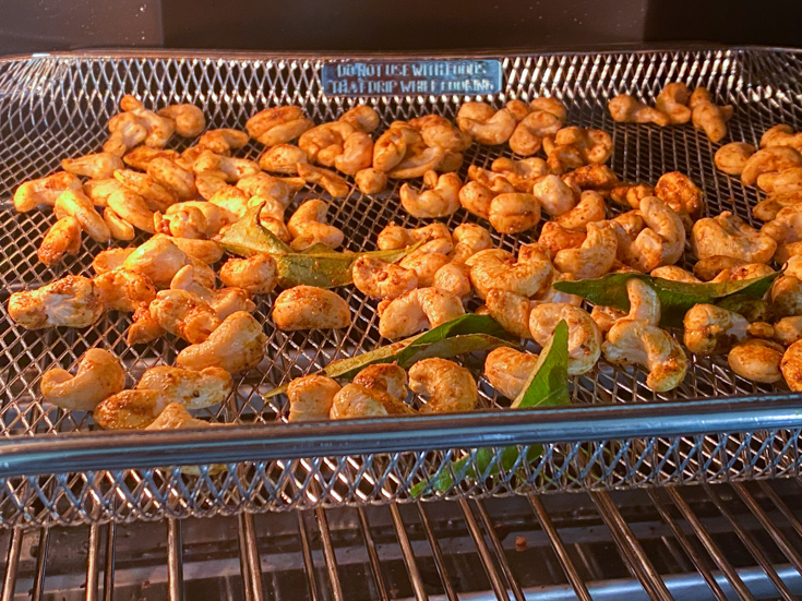 Cashews roasting in the air fryer