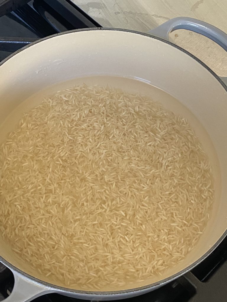 water and basmati rice in a dutch oven