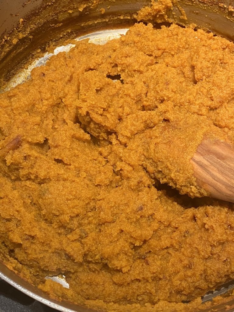 Pumpkin halwa coming together in a pan