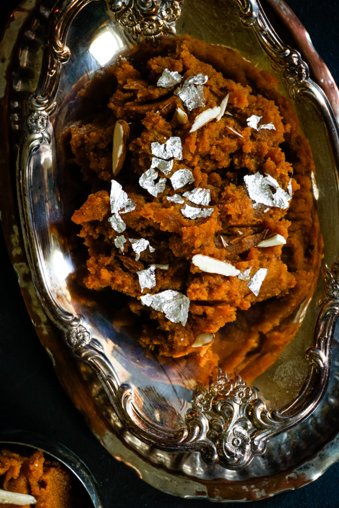 close up shot of Pumpkin halwa in a silver serving bowl