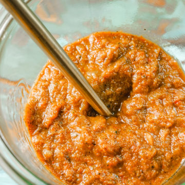 Thai red curry paste in a glass jar