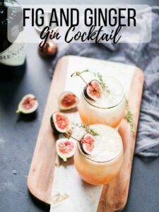 Two glasses with cocktails on a paddle board with figs around it and text on image