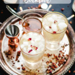 cardamom rose cocktail in two gold rimmed glasses on a silver platter