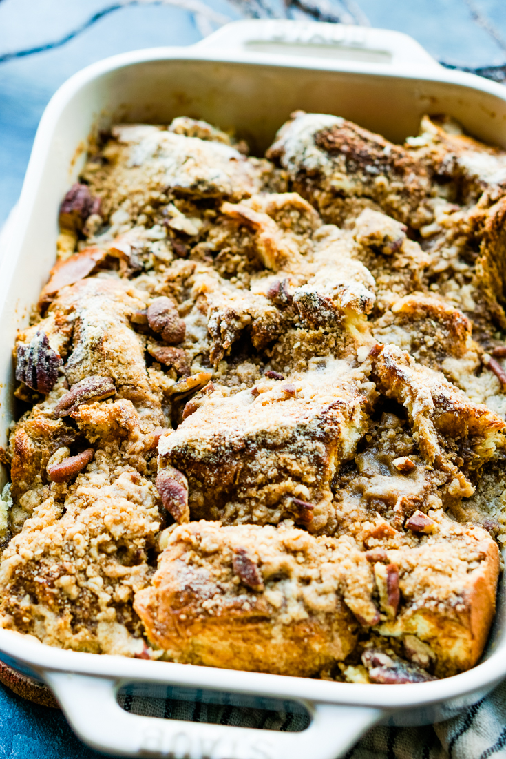 gingerbread french toast casserole in a white baking dish