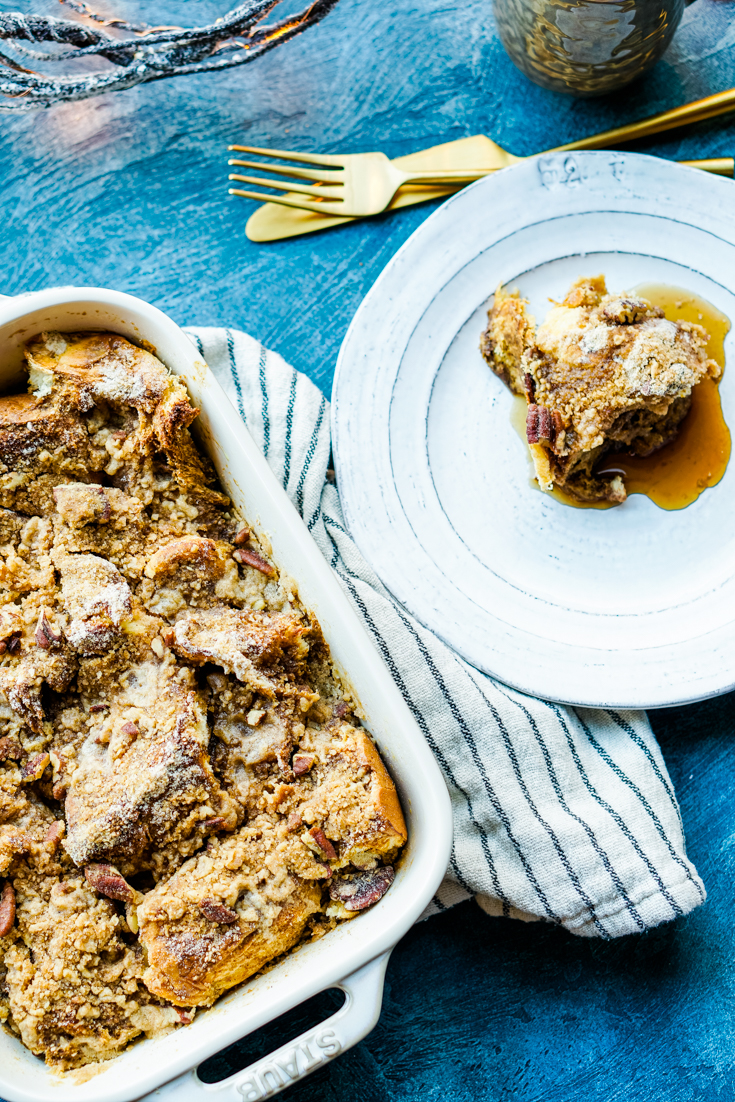 gingerbread french toast casserole in baking dish and served out on a plate