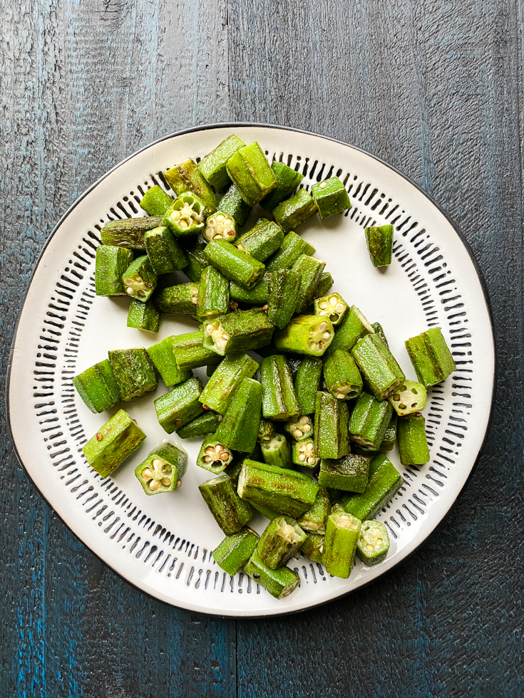 sauteed okra set on a plate