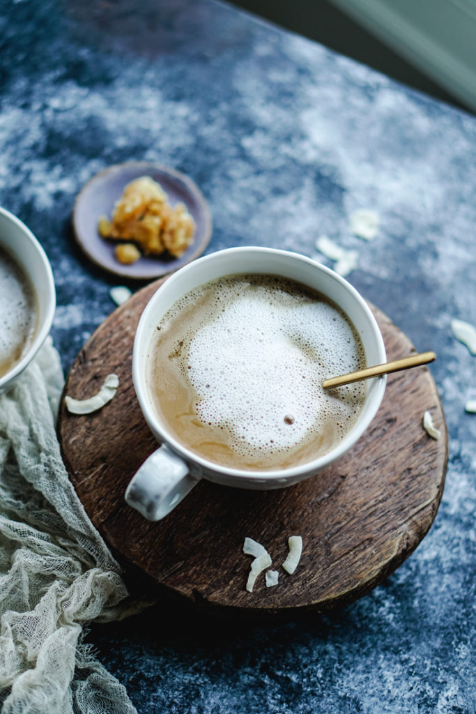 coconut cardamom latte in a white cup