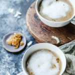 coconut cardamom latte in a white cup