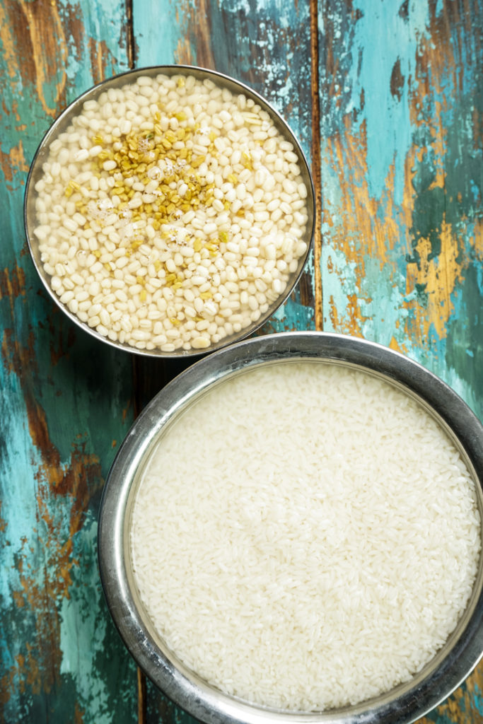 rice and urad dal soaking in water