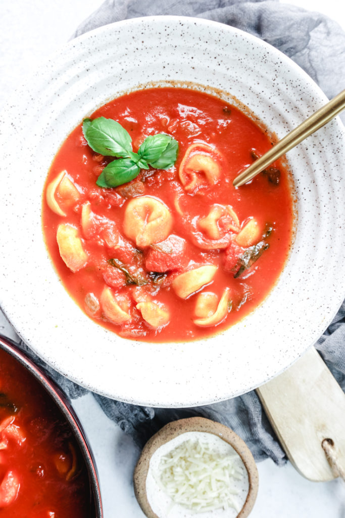 tomato basil tortellini soup in a bowl