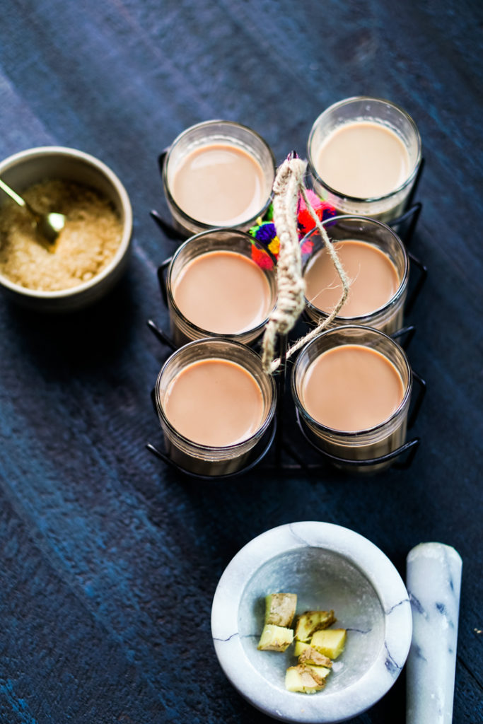 top shot of chai in glasses in a carrying stand