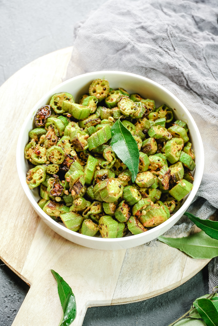 okra saute in a white bowl