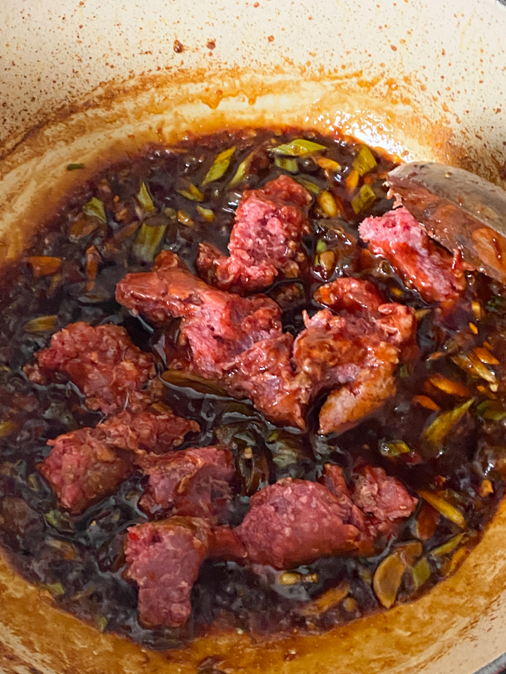pork in sauce in a pan