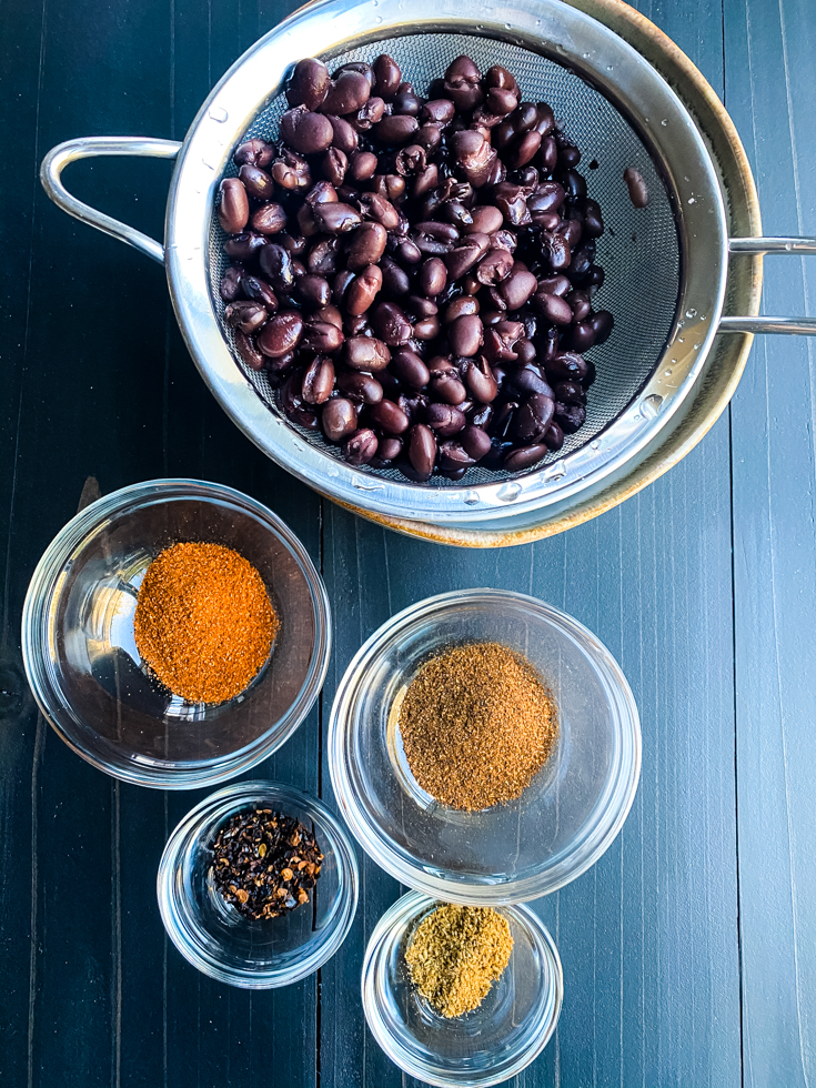 black beans and spices laid out