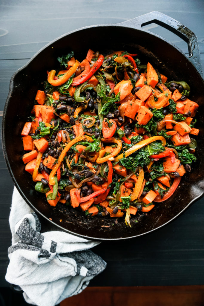 sweet potato kale and peppers in a skillet