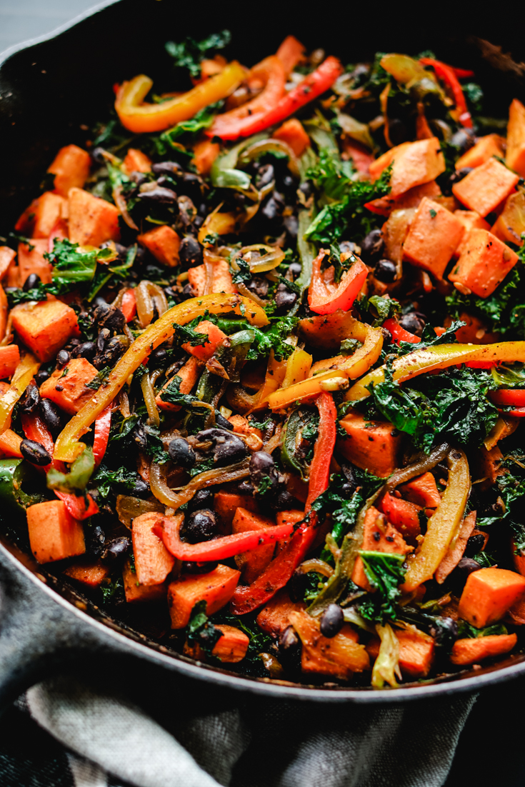 sweet potato kale and peppers in a skillet