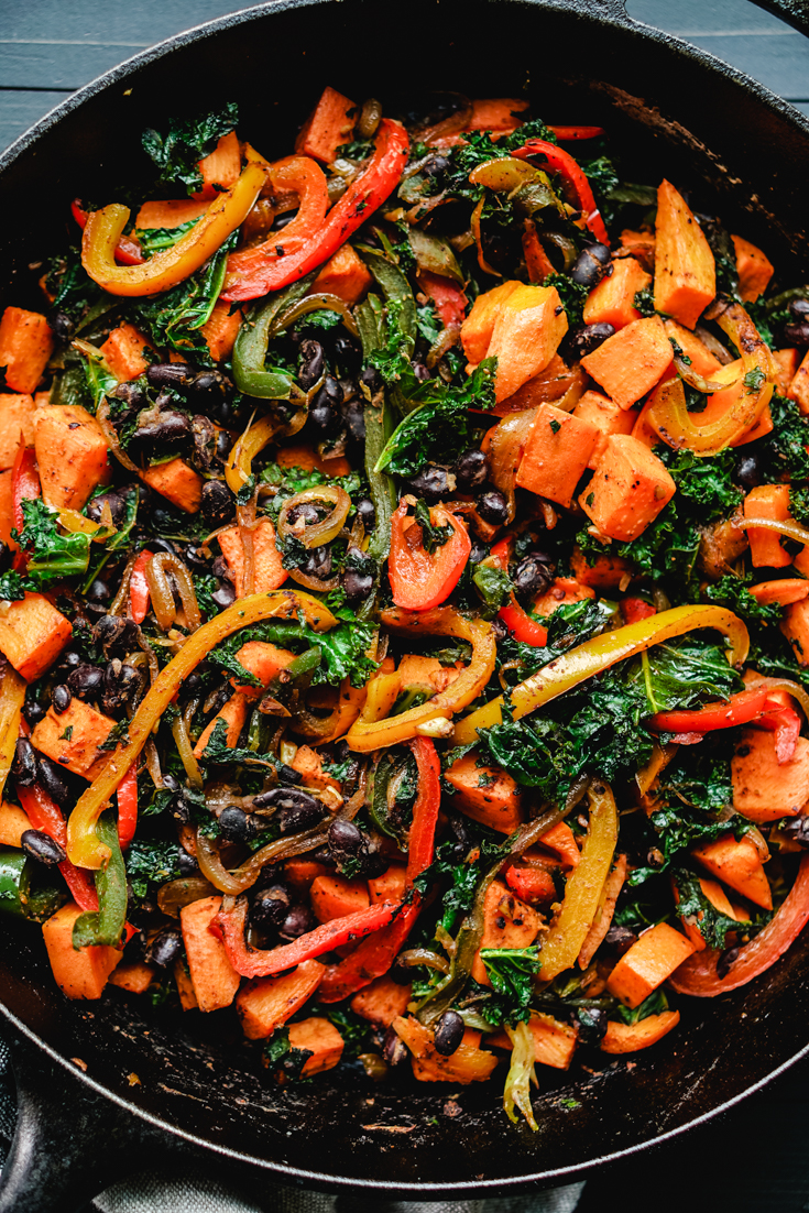 sweet potato kale and peppers in a skillet