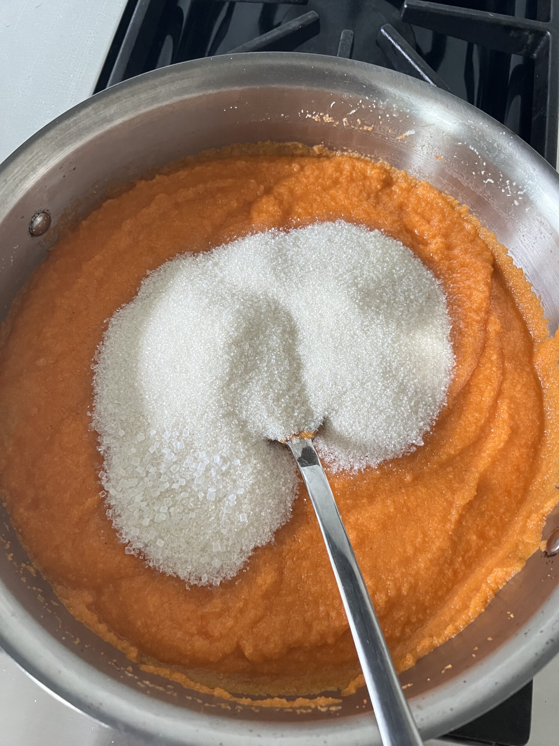 sugar added to the cooked rava in the pot