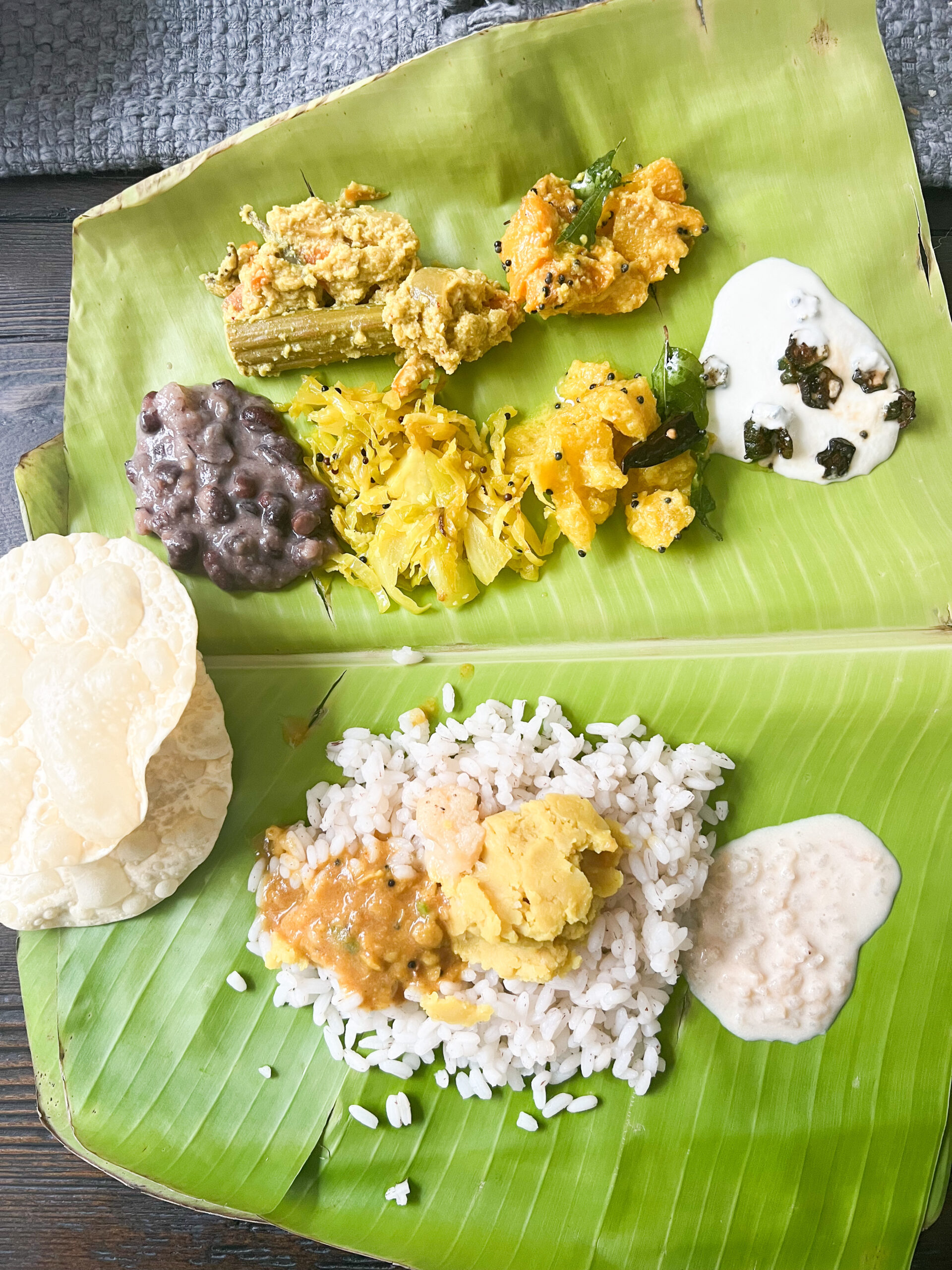 vegetarian dishes on a banana leaf