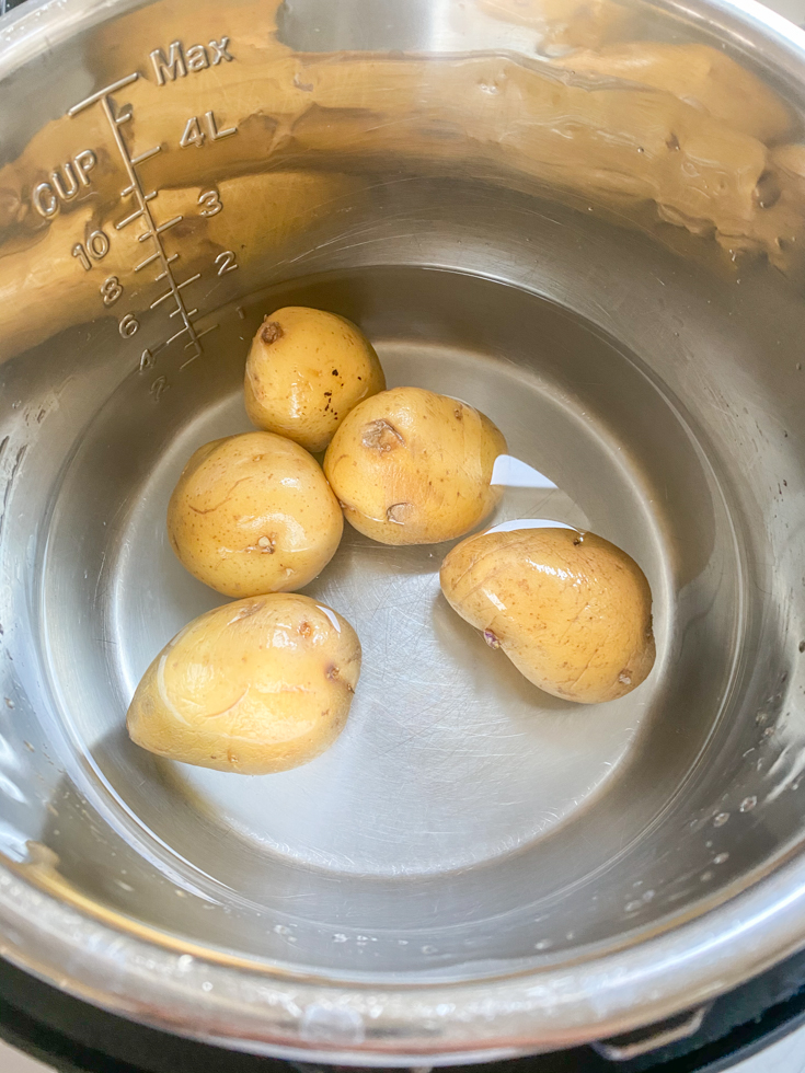 whole yellow potatoes in water in the instant pot