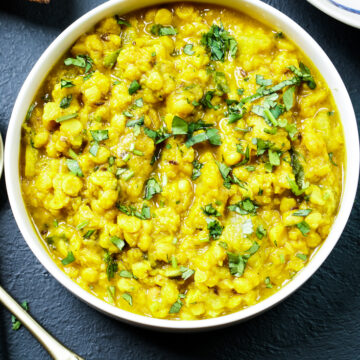 lauki chana dal in a white bowl