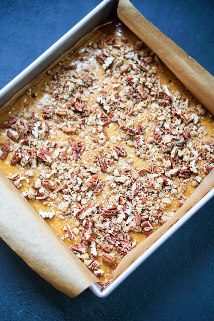 pumpkin pecan pie bar in the baking pan