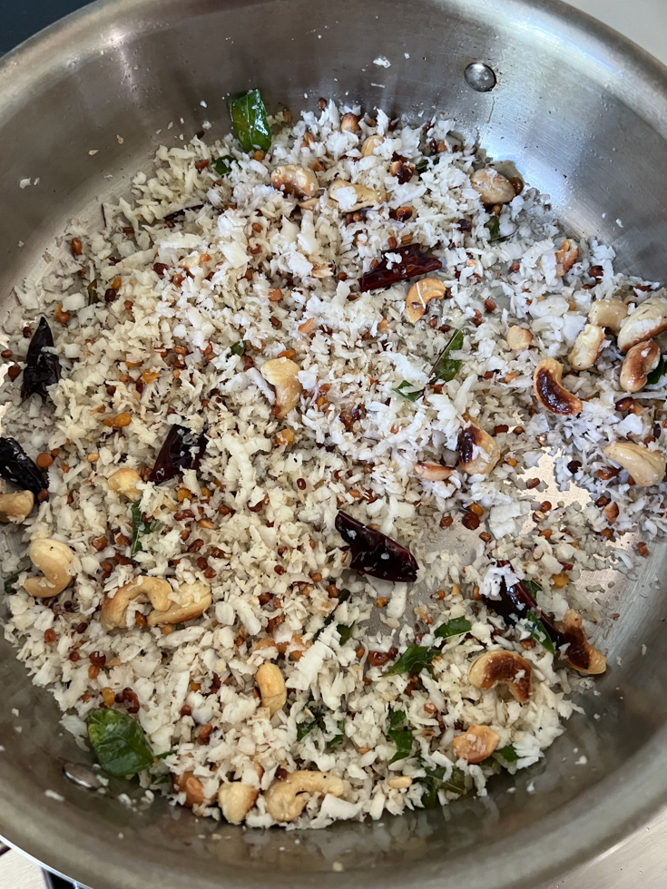 toasted coconut and nuts in a pan