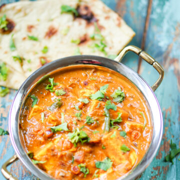 paneer masala in a copper and steel kadhai