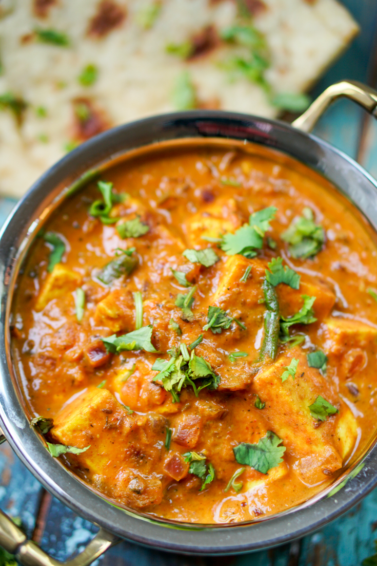 paneer masala in a copper and steel kadhai