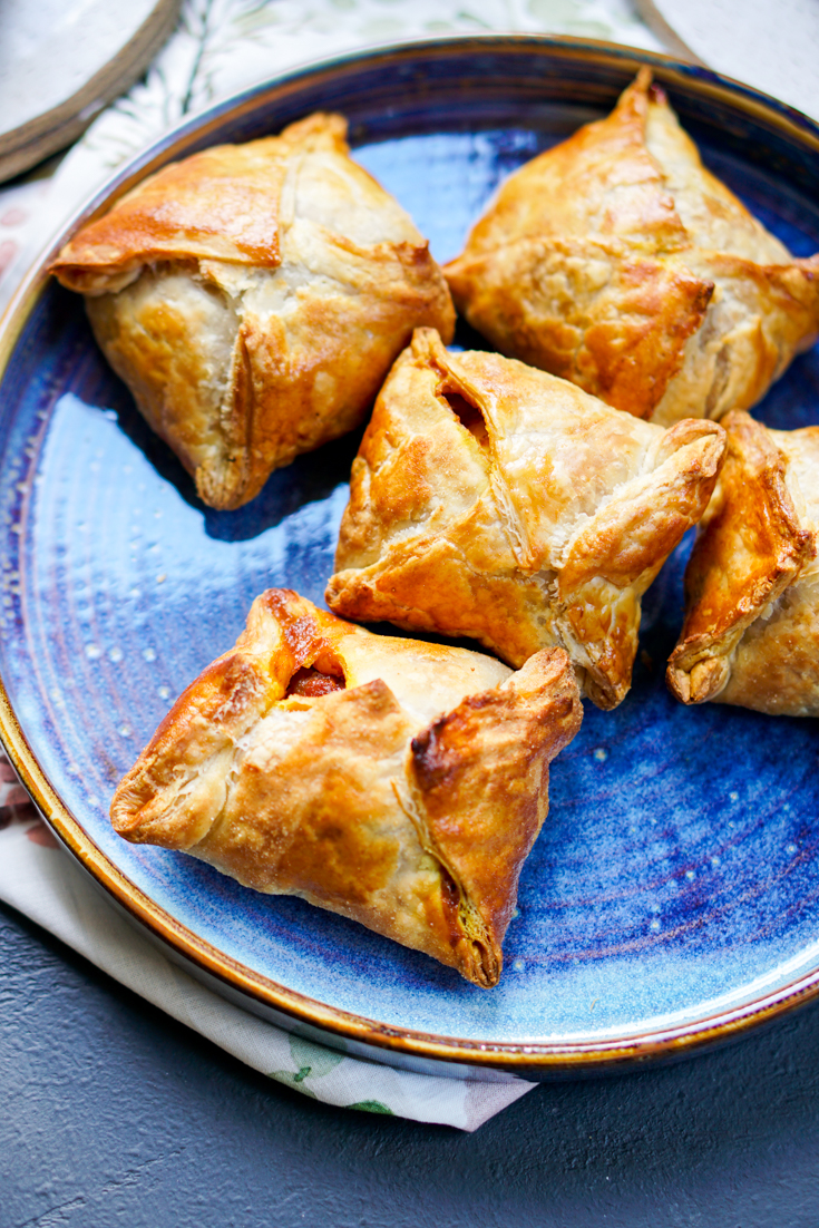 a blue plate of egg puffs