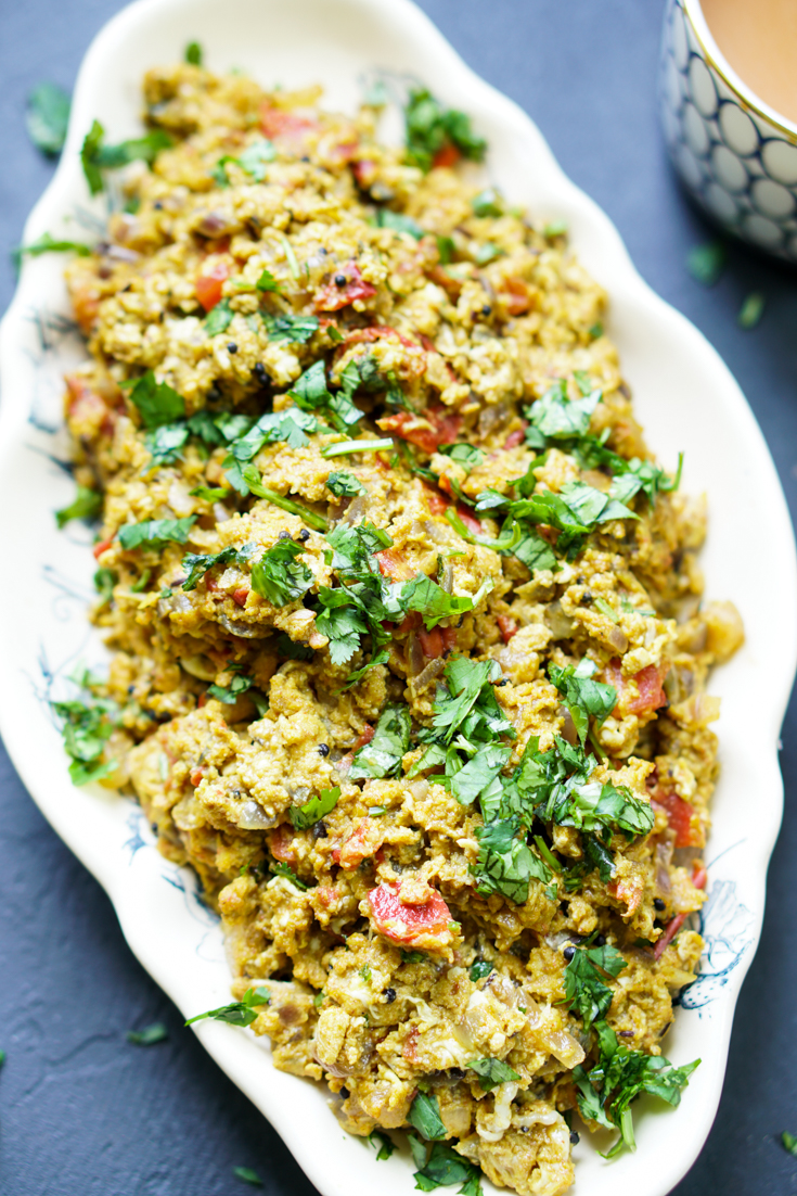 egg bhurji in a white oval platter