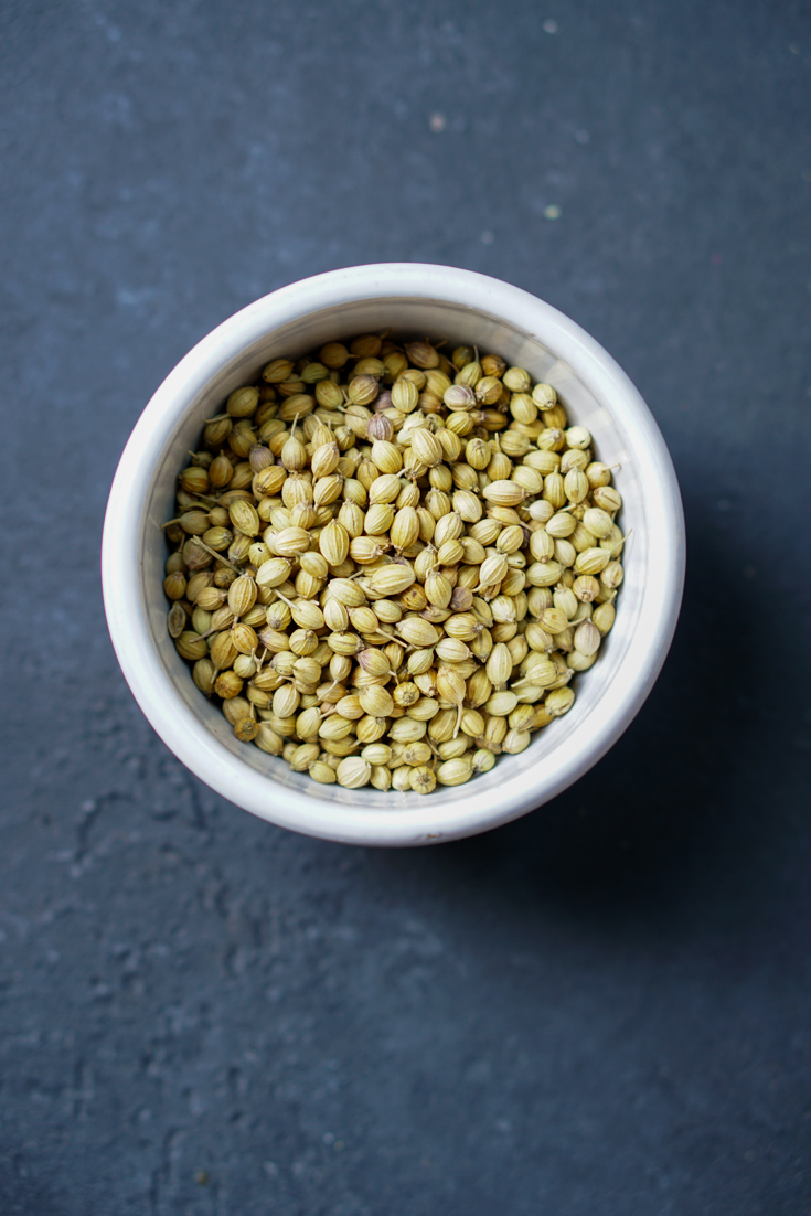 a bowl of coriander seeds