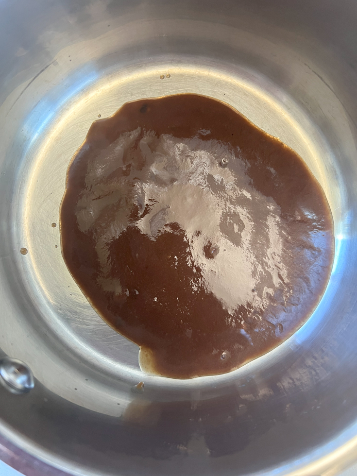 tamarind puree in a stainless steel sauce pan