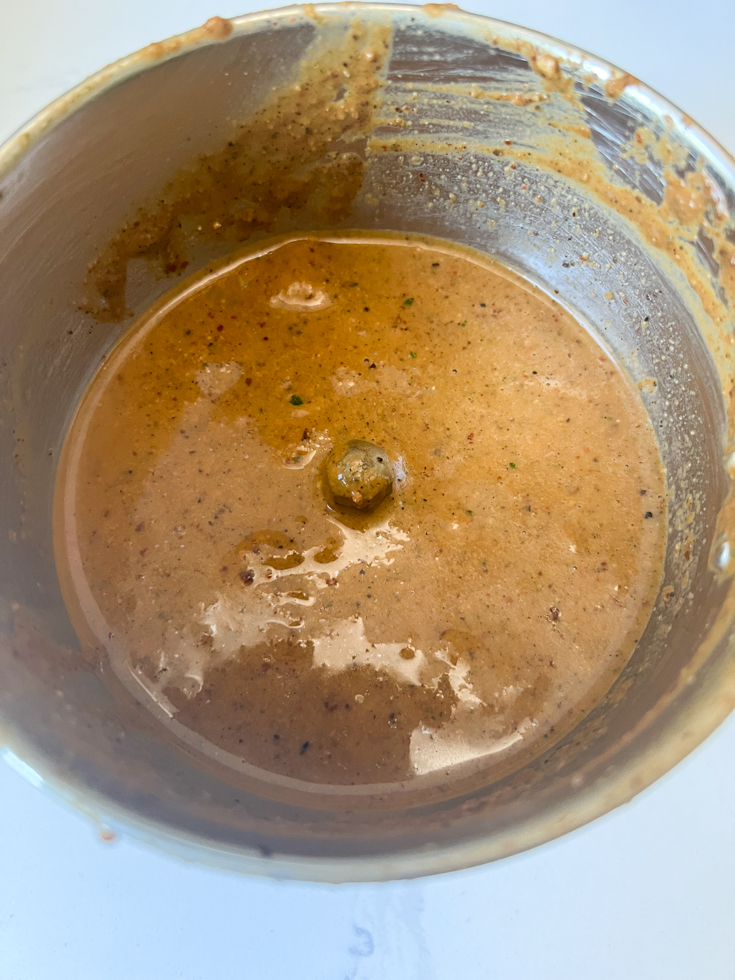 ground paste of lentil and chillies mixture in a blender jar